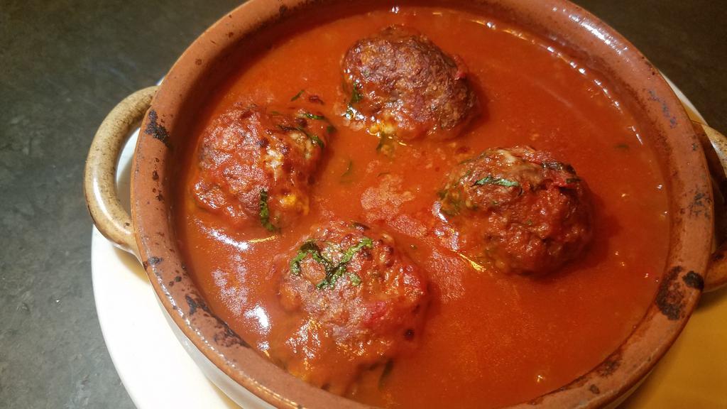 Polpettine Al Forno · Meatballs in a tomato sauce
cooked in a brick oven