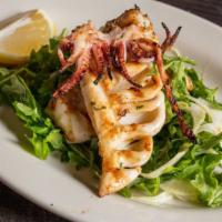 Calamari Alla Griglia Con Rucola E Insalata Di Finoochi · Grilled squid with arugula and fennel salad.