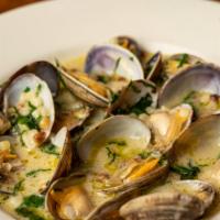 Fregola Con Brodino Di Vongole · Fregola broth with mussels and clams.