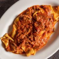Pappardelle Con Ragout Di Cinghiale · Fresh made pappardelle with wild boar ragout.