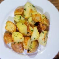 Patate Arrosto · Roasted potatoes.