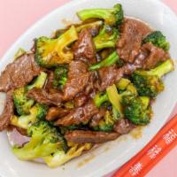 Roast Pork Or Beef With Broccoli · Served with fried rice.