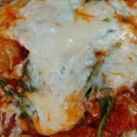 Chicken And Sausage Florentine · Chicken and Italian sausage topped with spinach and melted mozzarella in a marinara sauce wi...