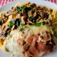 Chicken Saltimbocca · Most Popular. Chicken, spinach, prosciutto ham, mozzarella, and mushrooms in a garlic butter...
