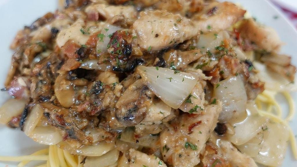 Chicken Casino · Chicken sautéed with bacon, mushrooms, and onions in a garlic butter white wine sauce.