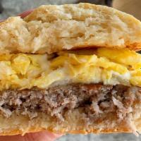 Mac · 3 whisked eggs, sausage, cheddar, basil, mayonnaise, and biscuit.