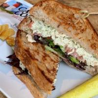 Basil Chicken Salad Sandwich · Multi-grain, shredded, chicken, caramelized onion, walnuts, and pesto-mayo with lettuce and ...