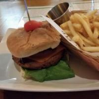Vegan Burger · Plant based burger with vegan cheese (LTO) choice of side of  french fries, sweet potatoes o...