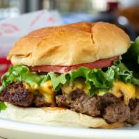 Our Famous Pounder Burger · Actually a huge 20 oz. burger.