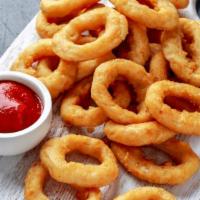 Our Famous Rings · They're dipped in our secret batter. Cooked in cholesterol-free peanut oil.