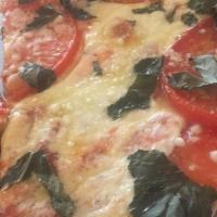 Margherita Pizza · Featuring the classic taste of our house marinara sauce, fresh mozzarella, basil and olive o...