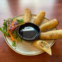 A-12 Spring Rolls · Mixed vegetable spring rolls served with sweet chili sauce. **If you need plastic utensils, ...