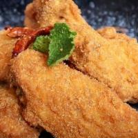 A-8 Zabb Wings · Crispy chicken wings dusted with spicy Thai herbs seasoning. **If you need plastic utensils,...