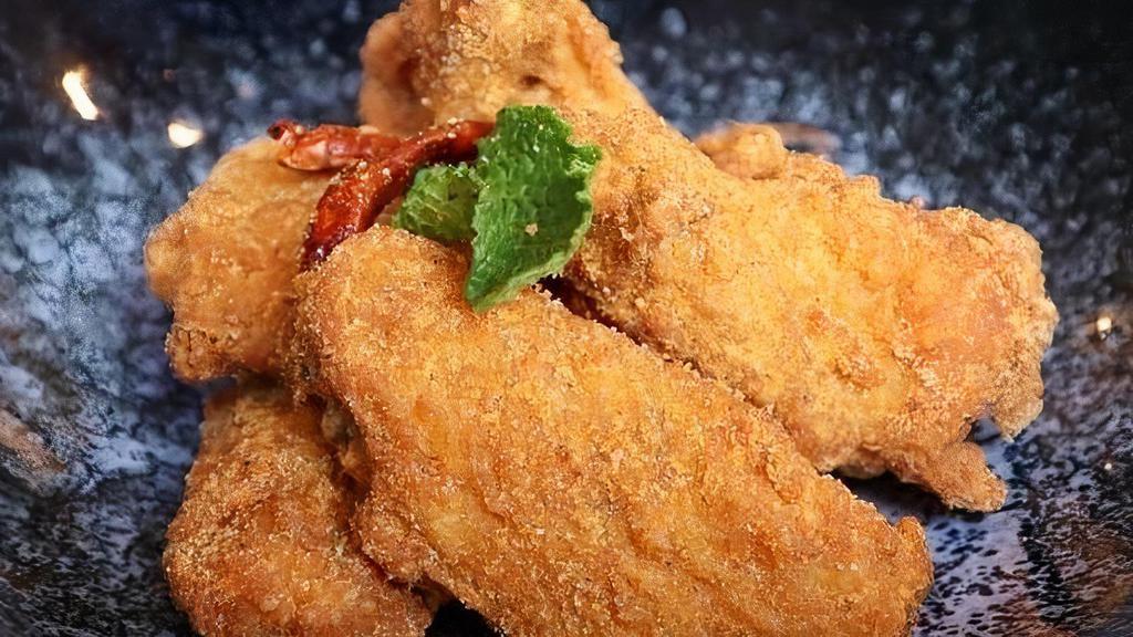 A-8 Zabb Wings · Crispy chicken wings dusted with spicy Thai herbs seasoning. **If you need plastic utensils, please request.**