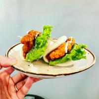 A-1 Crispy Chicken Buns · crispy fried chicken, lettuce, creamy lime sauce. **If you need plastic utensils, please req...