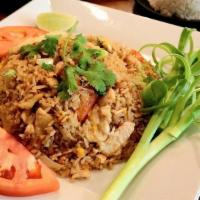 R-1 Thai Fried Rice · Egg, scallion, and onion. **If you need plastic utensils, please request.**