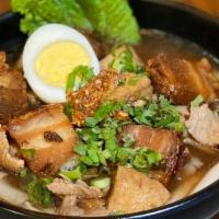 Ns- Guay Jub · Rice noodle rolls with pork, crispy pork, tofu, cilantro, scallion in dark broth. **If you n...