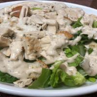 #18 Grilled Chicken Caesar Salad · Prepared with romaine lettuce, croutons Caesar dressing and grated Parmigiano cheese.