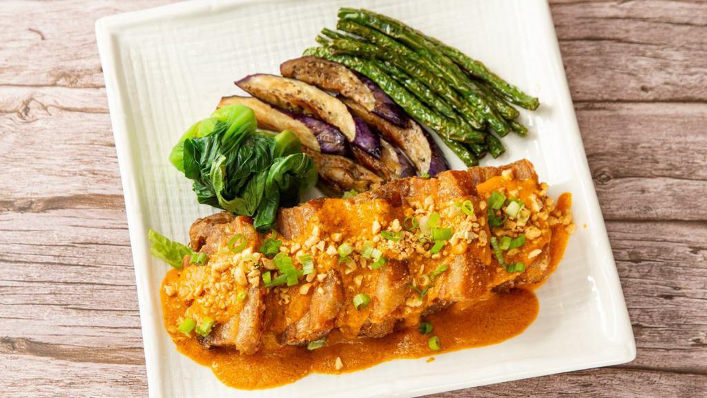 Kare-Kare · Stewed in Savory Peanut Sauce with Steamed Vegetables and Stir-fried Bagoong.