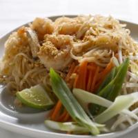 Pad Thai · Thai skinny board noodle with peanut egg and veggie in thai spicy tamarind fish sauce. Spicy.