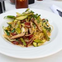 Linguine Alla Strega · Sauteed with shiitake mushroom, asparagus sun-dried tomatoes, zucchini, scallions in a light...