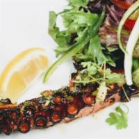 Grilled Octopus · With baby arugula, mixed peppers, onions, and cherry tomatoes.