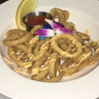 Crispy Calamari · With marinara and jalapeño sauce.