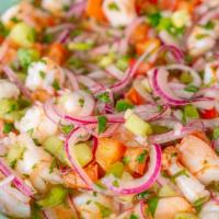 Shrimp Ceviche · Shrimp with mixed peppers, cherry tomatoes, mango, and onions.