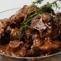Stewed Oxtail · Oxtail cut into small pieces and stewed in a brown sauce.