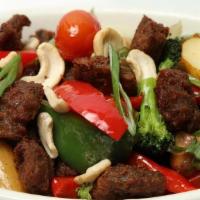 Vegan Garlic Beef Saute · Soy based vegan beef sauteed with vegetables and cashews. Vegan
