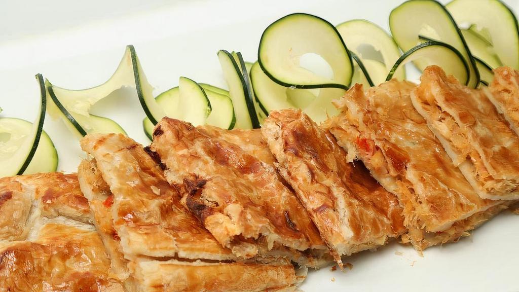 Fish Cakes · The West Indian fish cake of smoked cod fish seasoned and baked in a flaky crust.
