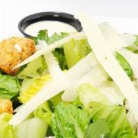 Cesar Salad · Fresh Romaine lettuce homemade crotons and fresh shaved Parmigianino Reggiano with Cesar dre...