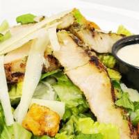 Grilled Chicken Cesar Salad · Fresh Romaine lettuce homemade crotons and fresh shaved Parmigianino Reggiano with Cesar dre...