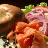 Bagel With Lox & Cream Cheese · Bagel, lox, cream cheese, tomatoes, caper and onions.