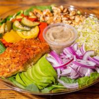 Grilled Salmon Salad · Baby spinach, grilled mixed vegetables, avocado, sprouts, red onion, walnuts. Comes with lem...