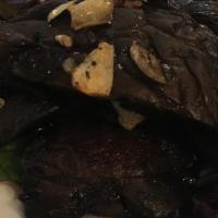 Mushroom Ragu · Braised shitake mushrooms, garlic, onions & extra virgin olive oil, garlic toasted crostini.