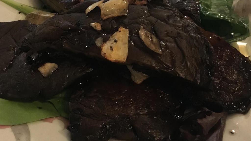 Mushroom Ragu · Braised shitake mushrooms, garlic, onions & extra virgin olive oil, garlic toasted crostini.
