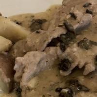 Piccata · Veal medallions sautéed in a lemon butter sauce with capers.