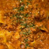 Salvatore Pappardelle Bolognese · Veal and pork in a light cream sauce.