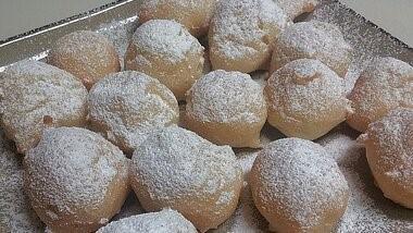 Zeppolis · Made on premises. Fried dough balls covered with powdered sugar.