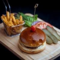 Sirloin Burger · Beef sirloin burger in sesame bun, tomato, lettuce, onions served with coleslaw and crispy F...