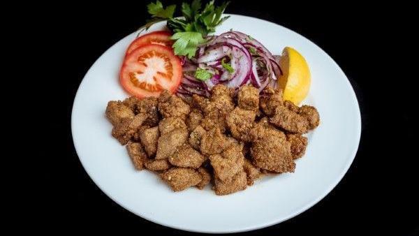 Fried Liver · Tender pieces of calf's liver breaded and deep fried then tossed with seasoning and herbs.