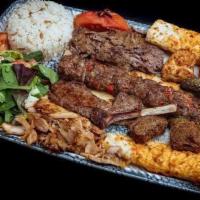 Mixed Grill · Gyro, shish kebab, chicken shish kebab, lamb chops and adana kebab served with rice and hous...