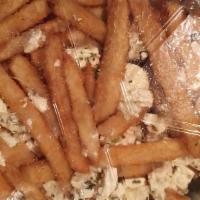 Greek Fries · Vegetarian. Crispy french fries, topped with feta cheese, lemon and oregano baked golden bro...