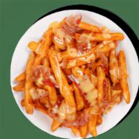 Loaded Fries - Signature Loaded Fries - Bacon Cheese · Contains: Bacon, Cheddar Cheese Sauce