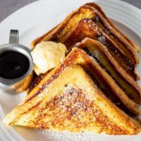 French Toast Sandwich · with pork roll, egg and cheese served with fruit.
