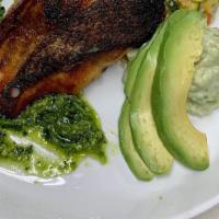 Pan-Seared Atlantic Salmon · Vegetable Couscous, Baby Bok Choy, Herb Pesto, Avocado Yogurt.