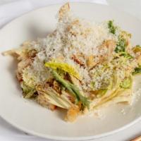 Chicory Caesar Salad · mixed chicories, Caesar dressing, sourdough croutons, and parmesan.