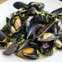 Classic Mussels · White wine, herbs, and garlic.