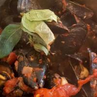 Fra Diavolo Mussels · San Marzano tomatoes, olive oil, fresh basil, red pepper, and garlic.